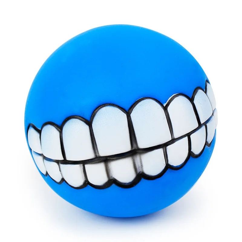 CanineChest blue squeaky teeth dog toy, durable and engaging chew toy, perfect for making playtime more amusing with its smiling teeth design.