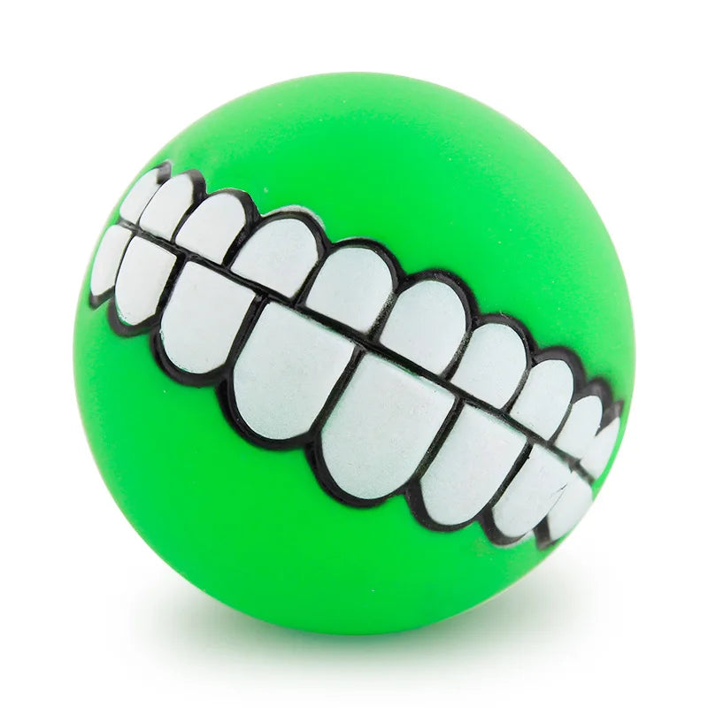 CanineChest green squeaky teeth dog toy, durable and entertaining chew toy with a unique smiling teeth effect for pets.