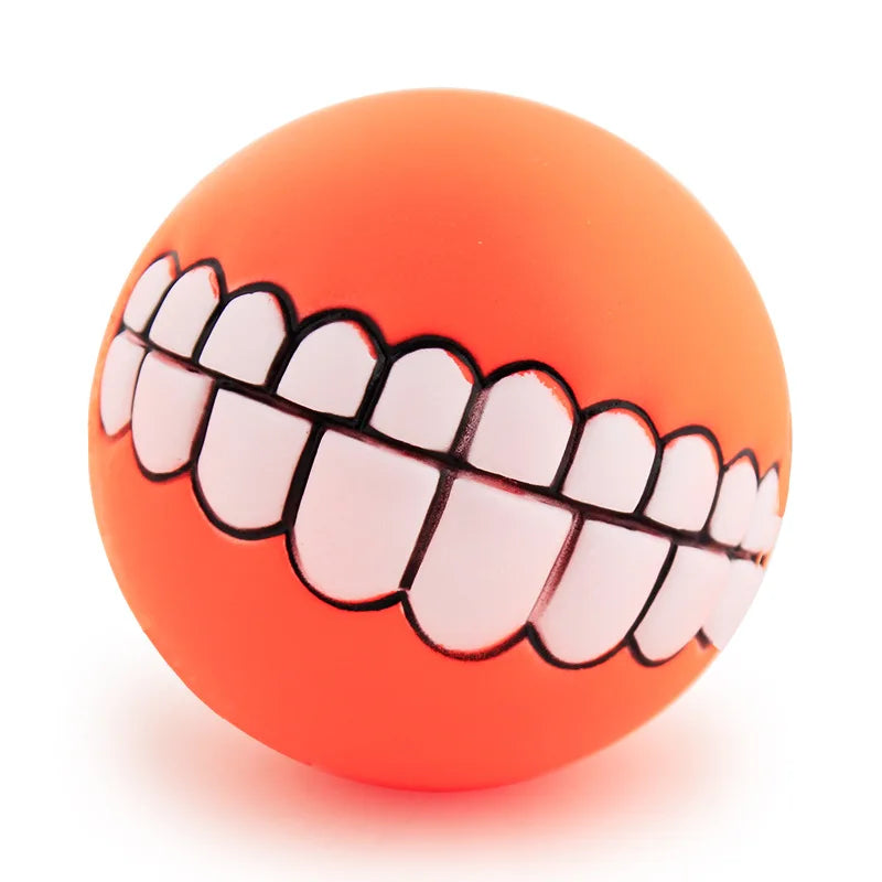 CanineChest orange squeaky teeth dog toy, fun and durable chew toy that creates a hilarious smile effect for playful pets