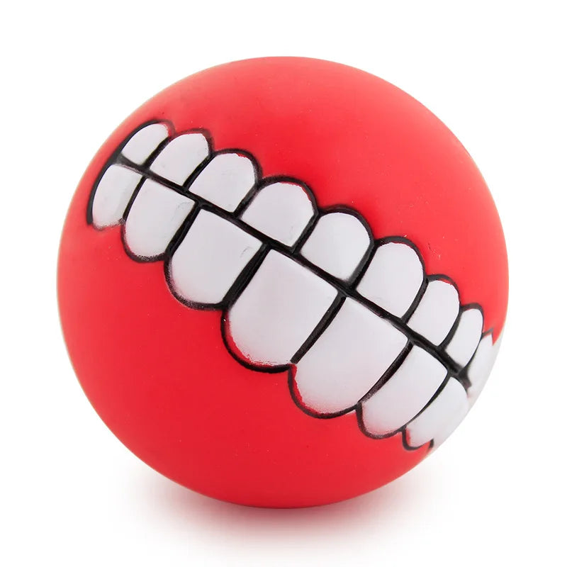 CanineChest red squeaky teeth dog toy, durable and fun chew toy designed to keep pets entertained with a hilarious smiling effect.