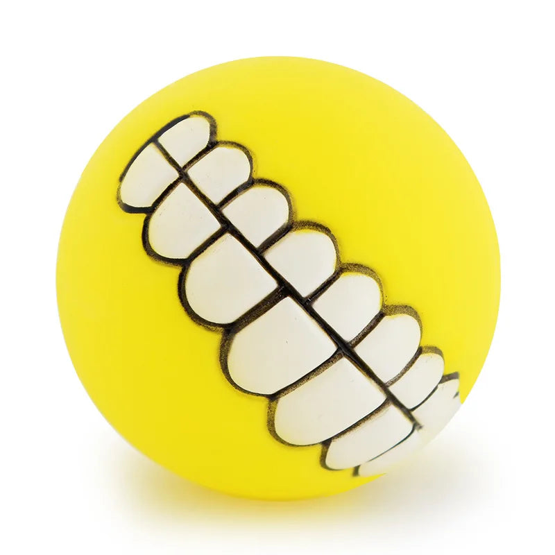 CanineChest yellow squeaky teeth dog toy, a funny and durable chew toy with a smiling teeth design to keep pets entertained.