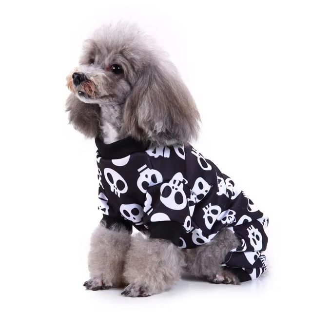 CanineChest skull pajamas for dogs, black outfit with white skulls, perfect for Halloween and spooky events.