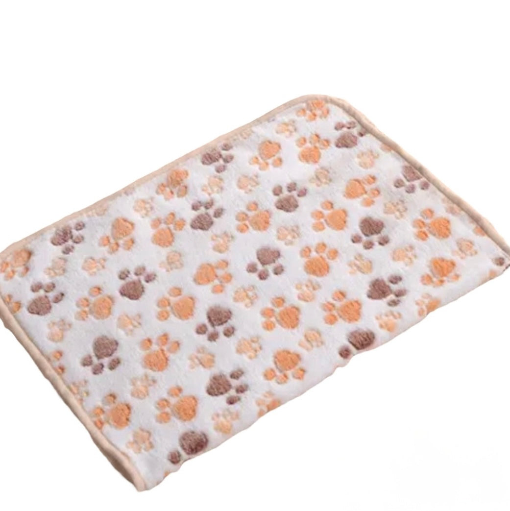 CanineChest small fleece pet bed mat, soft and warm for small dogs and cats, ideal for cozy bedding at home or on the go.