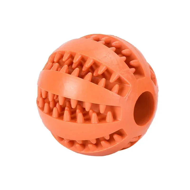 CanineChest orange tooth cleaning chew toy, a fun and durable option to help clean dogs' teeth and gums.